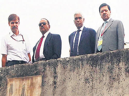 NSG Chief J N Choudhury, NSA Ajit Doval, IB chief Asif Ibrahim and NIA Director-General Sharad Kumar inspect  the blast site in Burdwan district on Monday. PTI