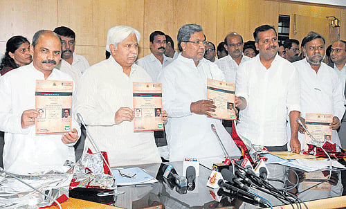 New findings: Chief Minister Siddaramaiah releases a survey report on tobacco-related diseases in Bangalore on Tuesday.  Medical Education Minister Dr Sharanaprakash Patil, Rural Development and Panchayat Raj Minister H K Patil, Health and Family Welfare Minister U T Khader and Social Welfare Minister H Anjaneya are also seen. dh Photo