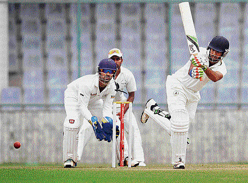 Patient knock: Central Zone's Faiz Fazal sends one to the fence during his 49 against South Zone on Thursday.