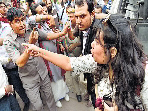 Delhi tried to embrace 'Kiss of Love', but massive police presence and counter protest by pro-Hindu groups made the going not so easy for the protesters against alleged moral policing. PTI Photo