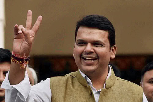 For the first time in nearly three months, Chief Minister Devendra Fadnavis met Shiv Sena chief Uddhav Thackeray amidst protests by some Sena activists at Bal Thackeray's memorial here Monday. PTI file photo