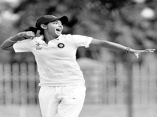 India's Harmanpreet Kaur celebrates after dismissing a South African batswoman on the third day of their one-off Test in Mysuru on Tuesday. dh photo