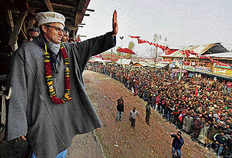 Jammu and Kashmir Chief Minister and National Conference working president Omar Abdullah waves to supporters at a rally after filing nomination papers for Assembly elections at Beerwah in Budgam district on Thursday. PTI