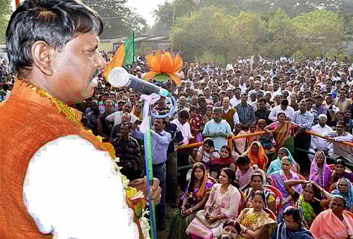 Former Jharkhand Chief Minister Arjun Munda addresses an election rally at Bokaro in Jharkhand on Monday. PTI Photo