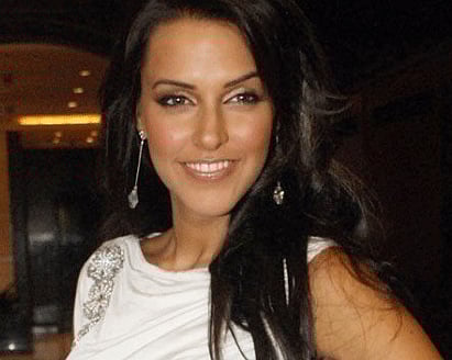 Actress Neha Dhupia feels lucky to have worked in filmmaker Karan Johar's upcoming production 'Ungli' and now wishes to be a part of film that is directed by him. Reuters file photo