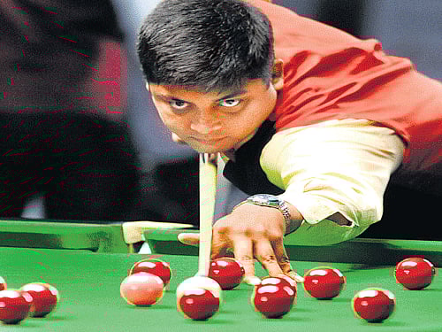 Brijesh Damani of India in action during his Round of 64 match against South Africa's Fakhrie Gierdien in Bangalore on Wednesday. DH photo/ kishor kumar bolar