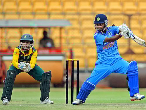 Shikha Pandey of India hits (scoring 59 runs) against South Africa during 3rd match of ICC Champions ODI at M Chinnaswamy Stadium in Bengaluru on Friday. DH photo