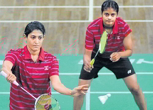 FOCUSED ONGC's Ashwini Ponnappa (front) and PC Thulasi in action in women's doubles final on Friday. DH PHOTO