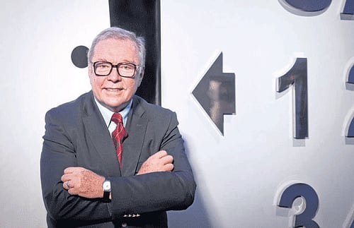 Filmmaker Krzysztof Zanussi & the poster of 'Foreign Body'