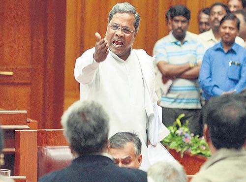 on the offensive: Chief Minister Siddaramaiah gestures while replying to a discussion on the development of North Karnataka, in the Assembly during the legislature session in Belagavi on Saturday. DH Photo