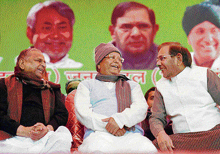 Samajwadi Party chief Mulayam Singh Yadav with RJD president Lalu Prasad Yadav and JDU chief Sharad Yadav.PTI