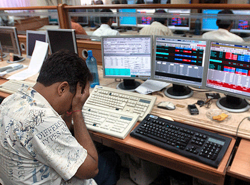 Indian benchmark indices witnessed a bloodbath on Tuesday aided by falling global crude oil prices and political uncertainty in Greece. PTI File Photo For Representation Only