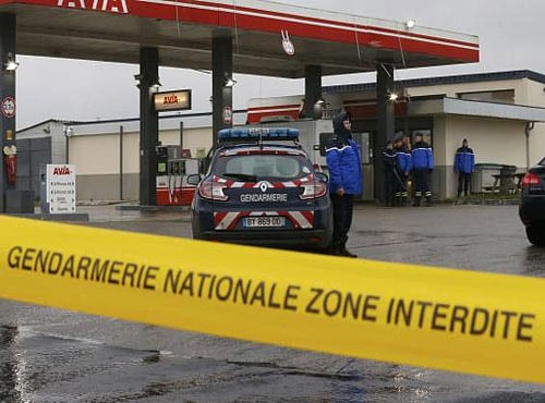French police and police investigators inspect the scene after an attack at a kebab restaurant near el Houda mosque in Villefrance-Sur-Saone near Lyon, the day after a shooting at the Paris offices of Charlie Hebdo. Reuters