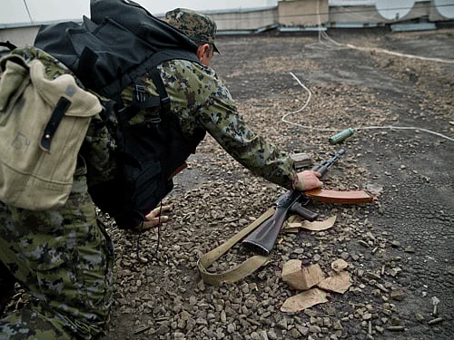 A photojournalist was shot at and three other persons were injured when the activists of Pakistan's right-wing Jamaat-e-Islami protesting against French satirical magazine Charlie Hebdo today clashed with police outside the French consulate here. AP file photo