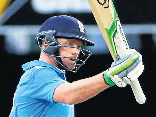 good start England's Ian Bell celebrates after scoring a half-century against India at the Gabba on Tuesday. Reuters Photo.