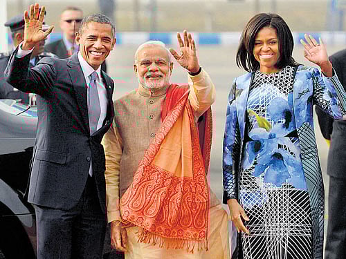 They have a dream: Prime Minister Narendra Modi is flanked by US President Barack Obama and First Lady Michelle Obama at Palam Air Force Station in New Delhi on Sunday. AP