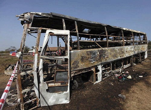 A major tragedy was averted late Tuesday night by an alert motorist on national highway 5. About 35 passengers aboard a Hyderabad-bound bus had a close shave after the engine of the bus they were travelling caught fire. File photo PTI