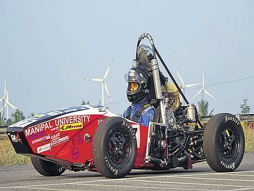 Team leader Abhinav Sharma behind the wheels. DH photo