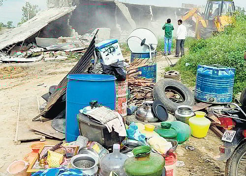 The Bengaluru Urban district authorities on Saturday reclaimed 66 acres and 17 guntas of encroached government land in four taluks. The value of the properties recovered is estimated at Rs 85.5 crore. DH file photo. For representation purpose
