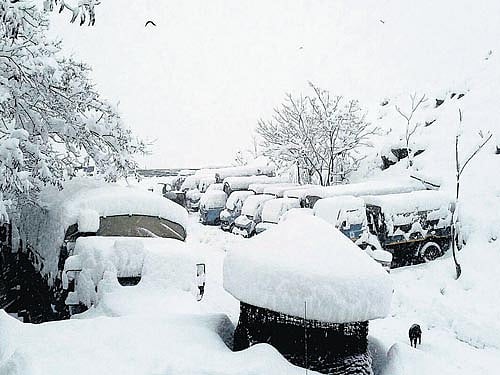 A view of the snow-covered CRPF camp near Jawahar Tunnel, the gateway to Kashmir valley, on Tuesday. PTI