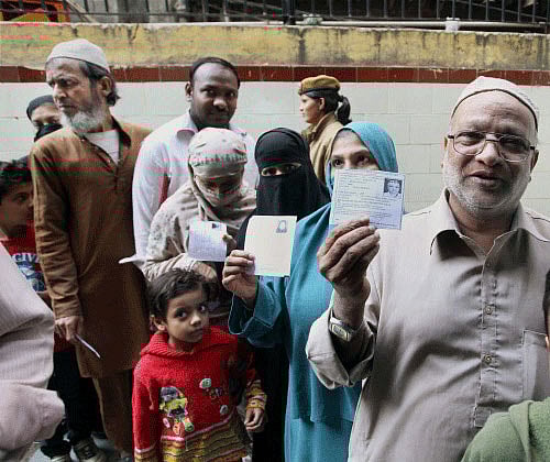 Voting for the 70-member Delhi assembly began across the national capital at 8 a.m..PTI File Photo