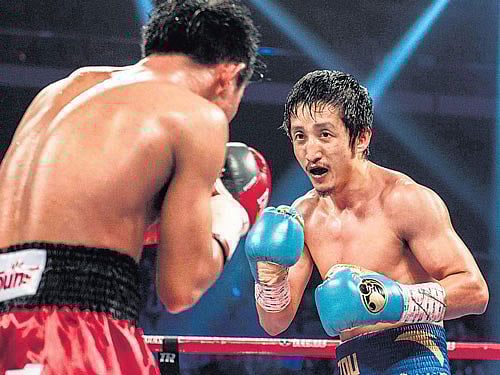 fresh chapter China's Zou Shiming, winner of two Olympic gold medals in 2008 and 2012 and three-time world champion in flyweight category, now wants to leave his mark in professional boxing. reuters