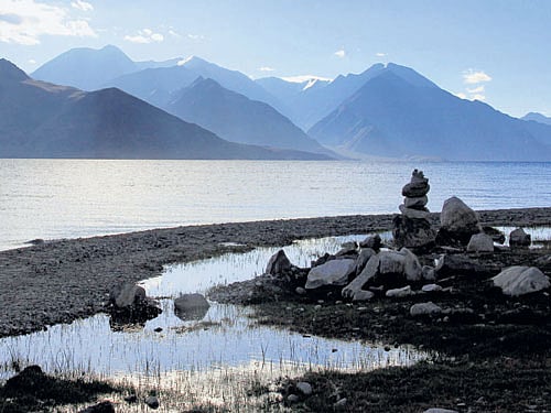 Serene confines (From top) Beautiful colours of Pangong Tso; playful marmots; a tranquil morning at the lake. Photos by Adityavikram More