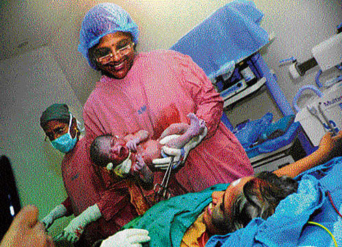 Rajeshwari (name changed), well past her menopause, delivered her own grandchild through surrogacy at a private hospital in Chennai. DH Photo