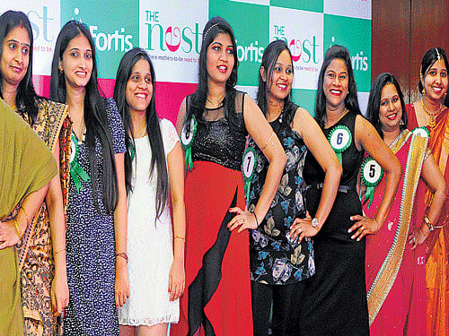 MOTHERS-TO-BE IN THEIR BEST: Expectant mothers participate in the Best of Nest fashion show organised at Fortis Hospitals in Bengaluru on Saturday. DH PHOTO