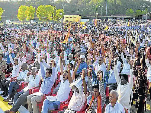 Supporters of Vishwa Hindu Parishat at the Virat Hindu Samajotsava, at Dasara Exhibition Grounds, in Mysuru, on Wednesday. dh photo