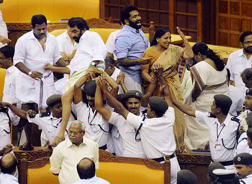A day after the unprecedented ruckus in the Kerala Assembly which saw both Congress-led ruling UDF and CPI(M)-led Opposition LDF coming to blows, the two camps are gearing for another showdown seeking action against each other for the troubles in the House. PTI photo