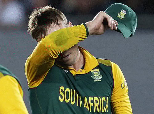 South Africa's captain AB de Villiers reacts after a failed run out attempt on New Zealand's batsman Corey Anderson during their Cricket World Cup semi-final match in Auckland. Reuters file photo