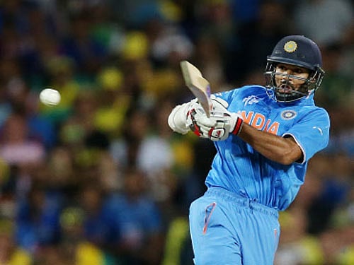 Shikhar Dhawan plays a shot while batting against Australia during their Cricket World Cup semifinal in Sydney, Australia. AP photo