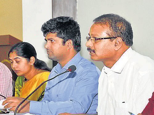 Zilla Panchayat CEO P A Gopal, Deputy Commissioner C Shikha, MPs Pratap Simha and R Dhruvanarayan, and Zila Panchayat President Pushpa Amaranth, during the meeting, in Mysuru, on Saturday. DH PHOTO