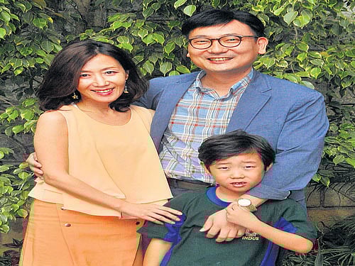 satisfied Boo Kyoung Yun and Joomin Lee with son Namgu Lee. DH PHOTO&#8200;BY&#8200;BK&#8200;JANARDHAN