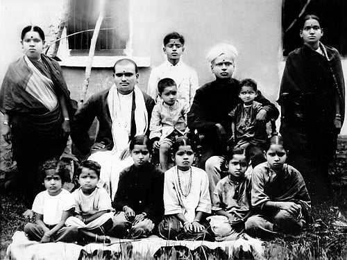 (Standing from left) Annapoorni, Mahalingam and Lakshmi. (Sitting on chair) Dharmarajasiva, Srinivasan, RK Ramanatha Iyer and author (on Ramanatha Iyer's lap). (Sitting on the ground) Mohana, Mangala, Jayalakshmi, Shamala, Viji and Romala.