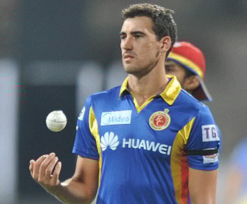 RCB's Mitchell Starc during their practice session on the eve of their IPL match against RCB at Chinnaswamy Stadium in Bengaluru. DH photo