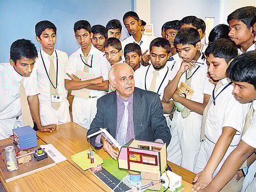 keen The students taking a look at the models.