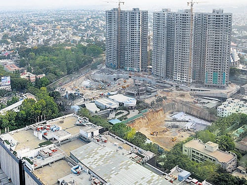 space crunch Due to limited land parcels in Rajajinagar, small plots are being amalgamated for new homes. dh PHOTO by b h shivakumar
