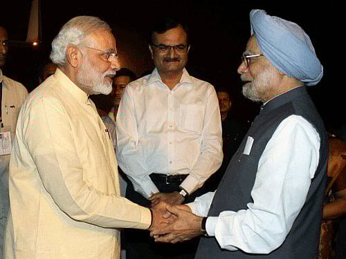 Prime Minister Narendra Modi and Manmohan Singh. PTI File Photo.