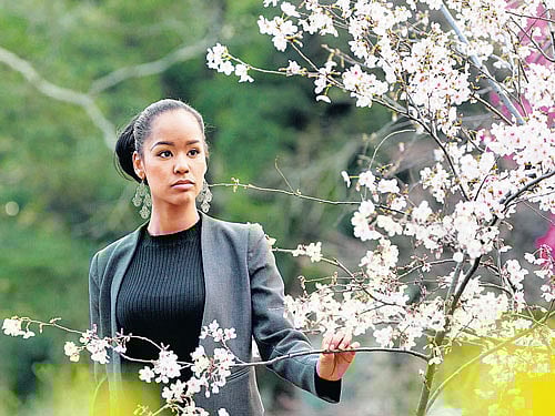 Ariana Miyamoto, Miss Universe Japan2015, at HamarikyuGardens in Tokyo.Miyamoto, the first half-black Miss Universe Japan, has endured slurs since shewas a child. "Eventoday," she said, "Iamusuallyseennot as a Japanese but as a foreigner". NYT