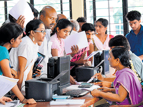 Physically challenged students attend CET counselling for medical seats at the CET cell in Bengaluru on Wednesday. DH PHOTO