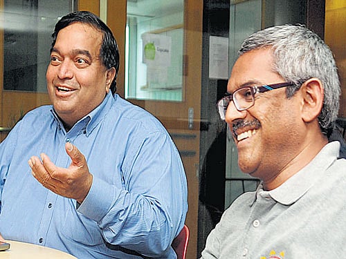 NASSCOM Product Council Chairman Ravi Gururaj (left) and AngelPrime Managing Partner Sanjay Swamy during the hackathon in Bengaluru on Saturday. DH PHOTO