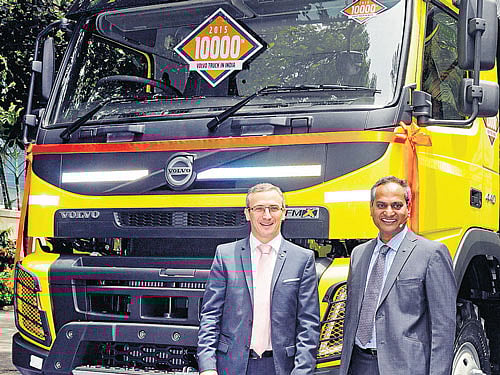 Volvo Group Truck Sales India President Pierre Jean Verge-Salamon (left) and Senior Vice President Rama Rao A S unveil the company's 10,000th truck in Bengaluru on Thursday. DH Photo by S K Dinesh