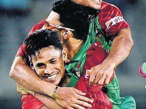 Mustafizur Rahman (left) spelt India's doom with a 5/50 in his debut ODI. AP