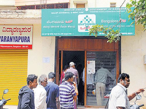 Customers are complaining about ineffecient service and  delays at BangaloreOne centres. DH photo