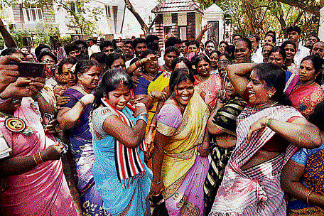 AIADMK supporters celebrate Jayalalitha's triumph in RK Nagar bypolls in Chennai on Tuesday. PTI