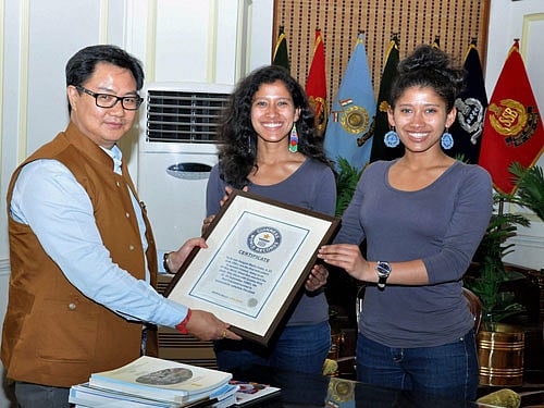 Kiren Rijiju meeting with World's first female twins to climb Mount Everest, Tashi and Nungshi Malik in New Delhi on Tuesday. PTI Photo.