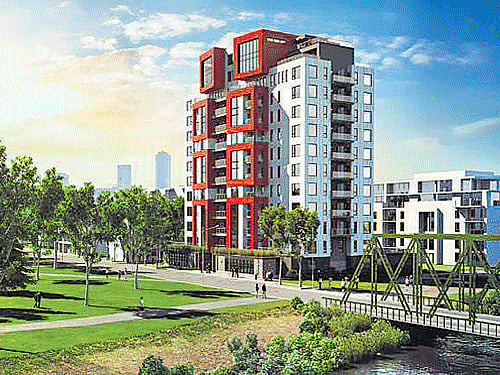 Quebec City's Pointe-aux-Lievres eco-district is getting a 13-storey tower constructed mostly of CLT, with 12 storeys of apartments on top of a concrete podium.