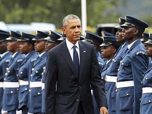 U.S. President Barack Obama reviews a Kenya Defence Forces honour guard during a visit to the State House in Kenya's capital Nairobi. Reuters File Photo